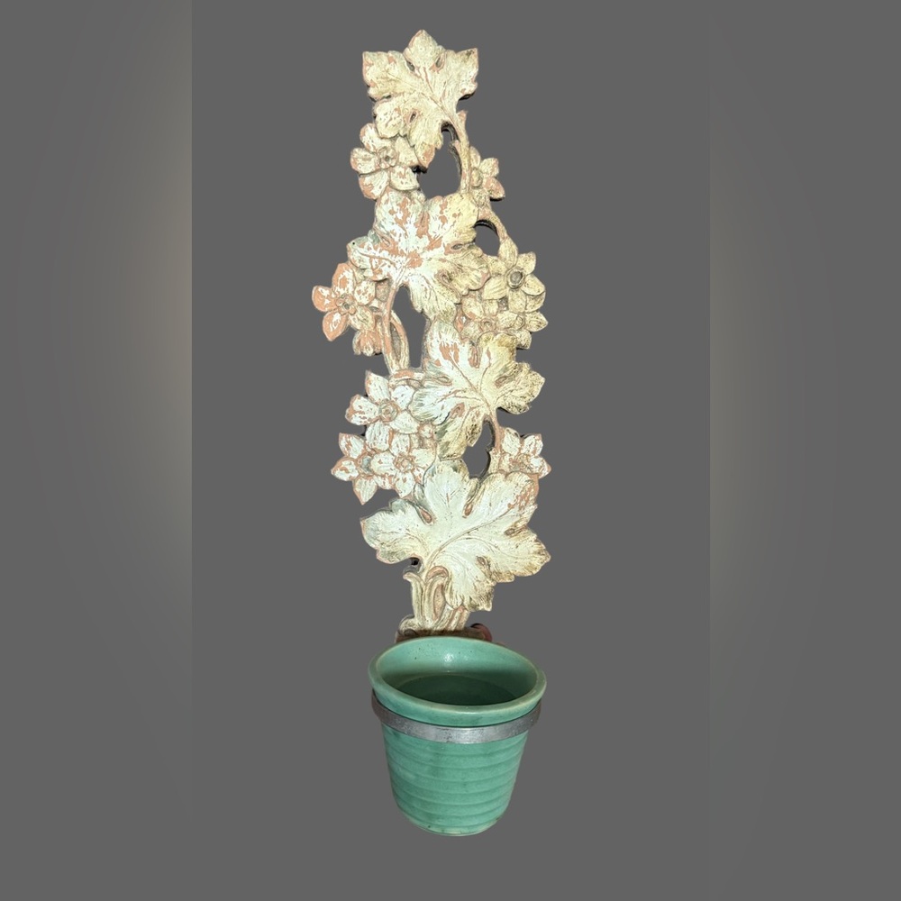 Antique wall decor with flower pot